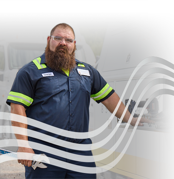 Dan Bell standing by service truck mobile Dan Bell standing by service truck mobile
