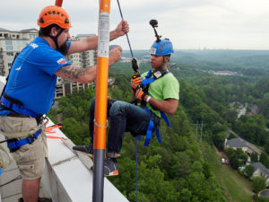 Cox Automotive team member rappel down a 22-story building